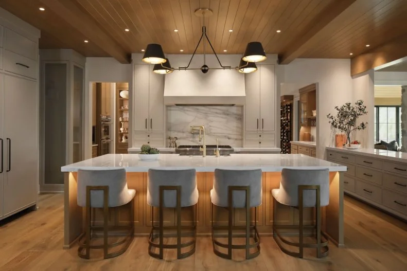 Four Barstools at Kitchen Island With Undercounter Lighting