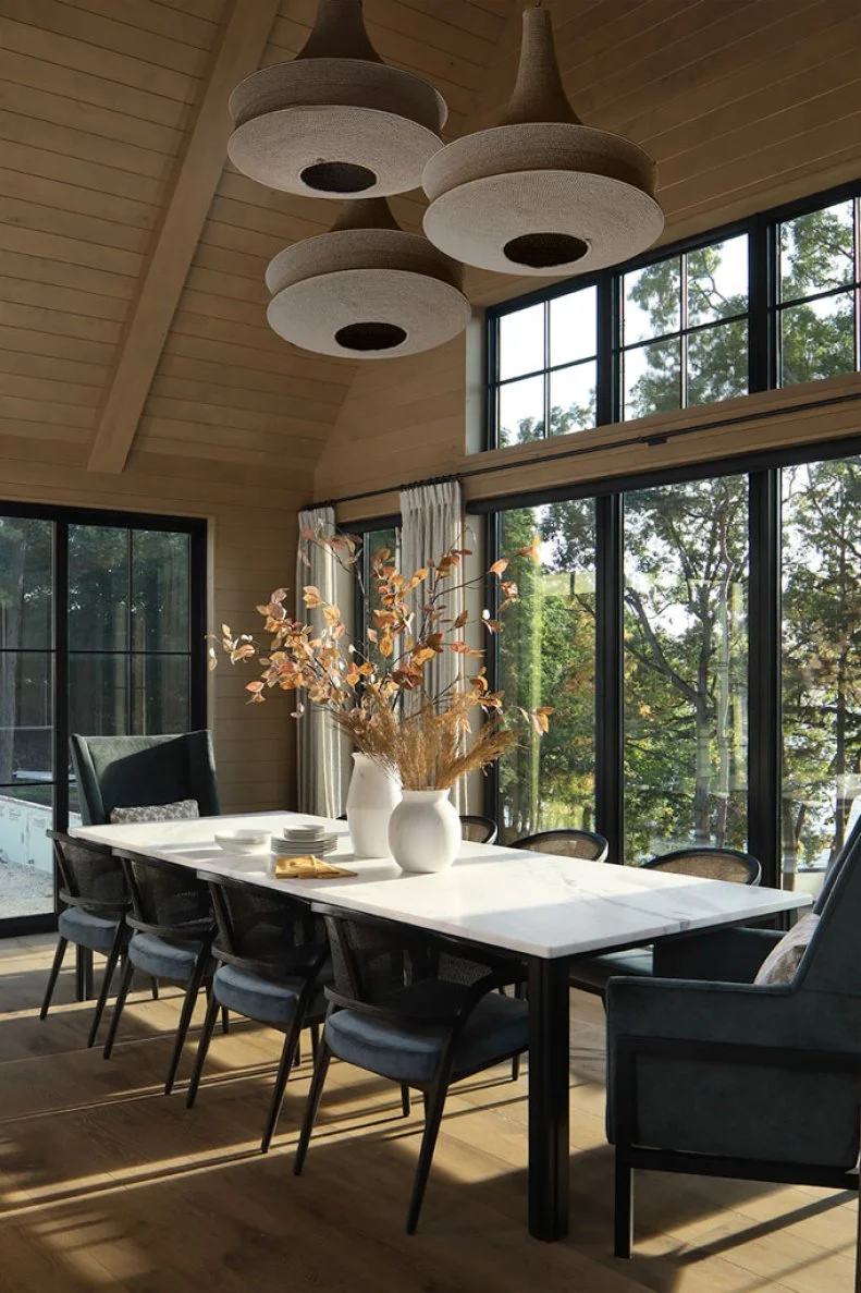 Trio of Pendant Lights in Neutral Transitional Dining Room