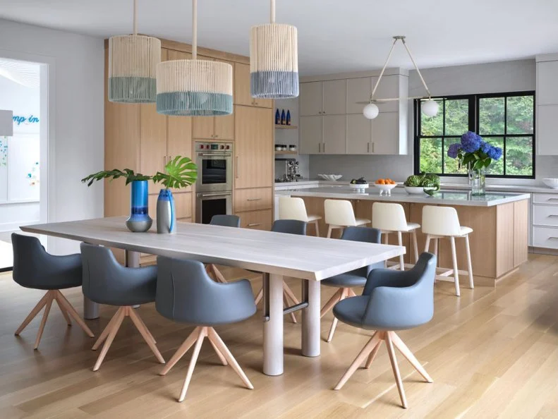 Dining Room Table Adjacent to Neutral Contemporary Kitchen