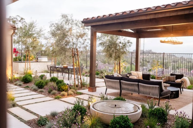 Round Water Feature Next to Covered Patio