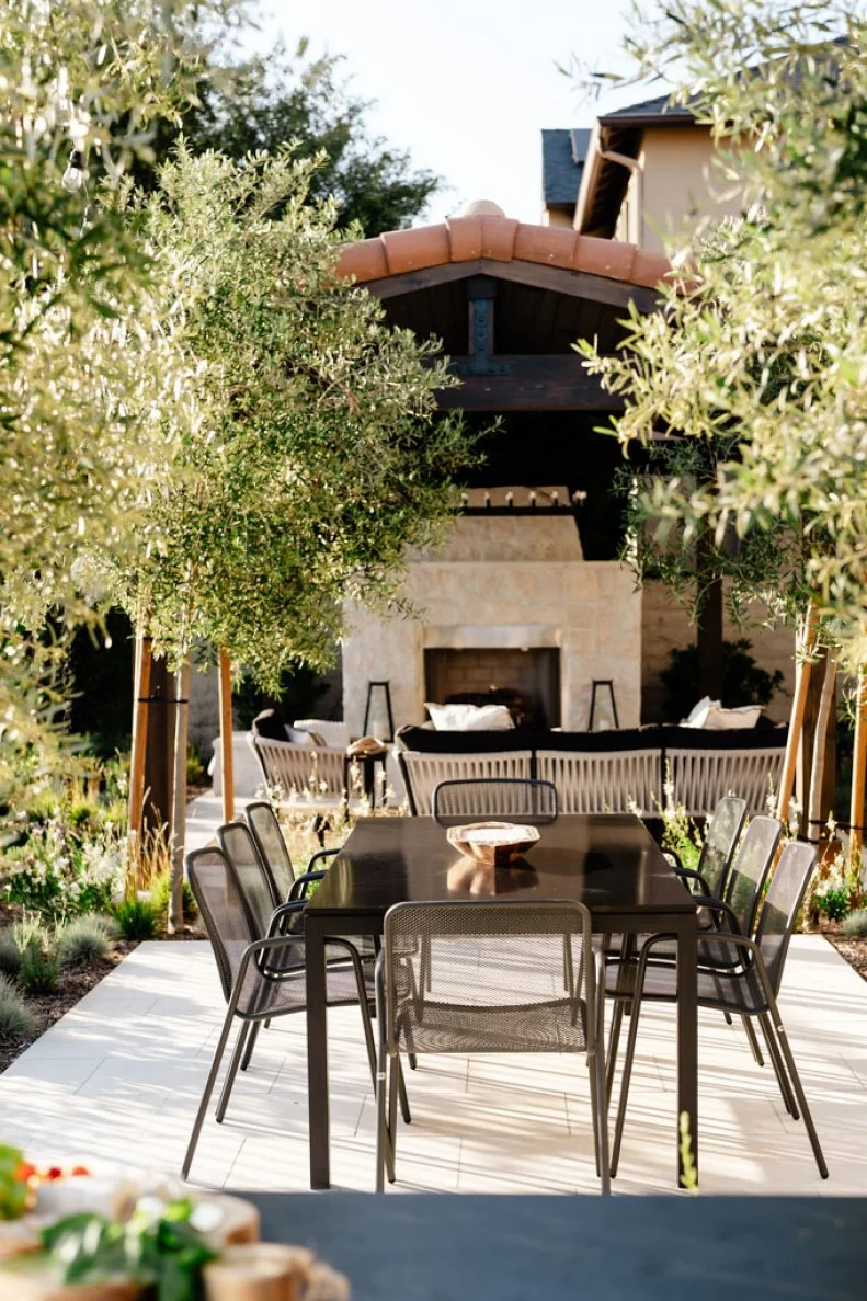 Outdoor Dining Area With Covered Patio in the Background