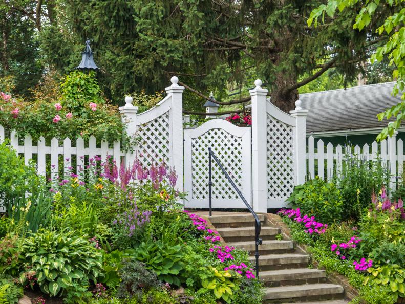 White Picket Fence and Gate to a Beautiful Garden