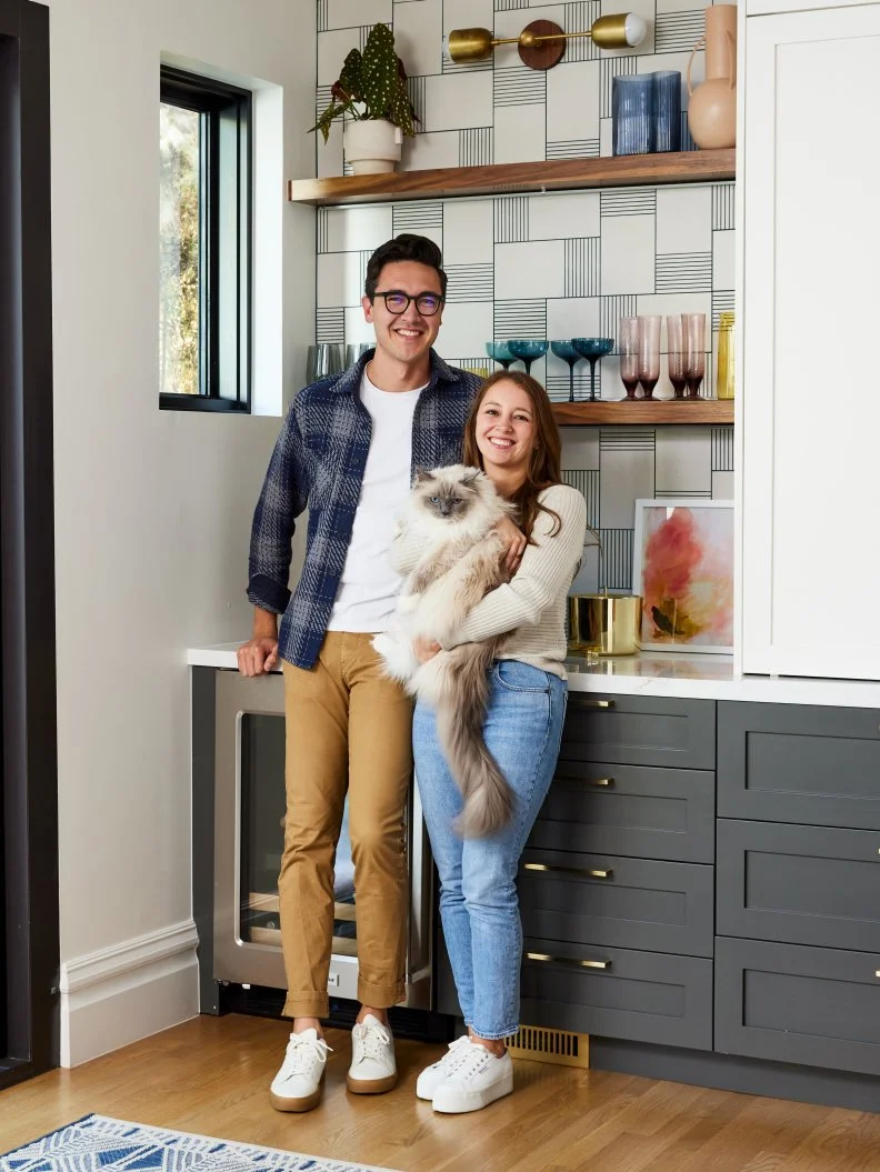 HGTV Magazine takes you inside this couples remodeled kitchen with contemporary style and a drink station for entertaining.