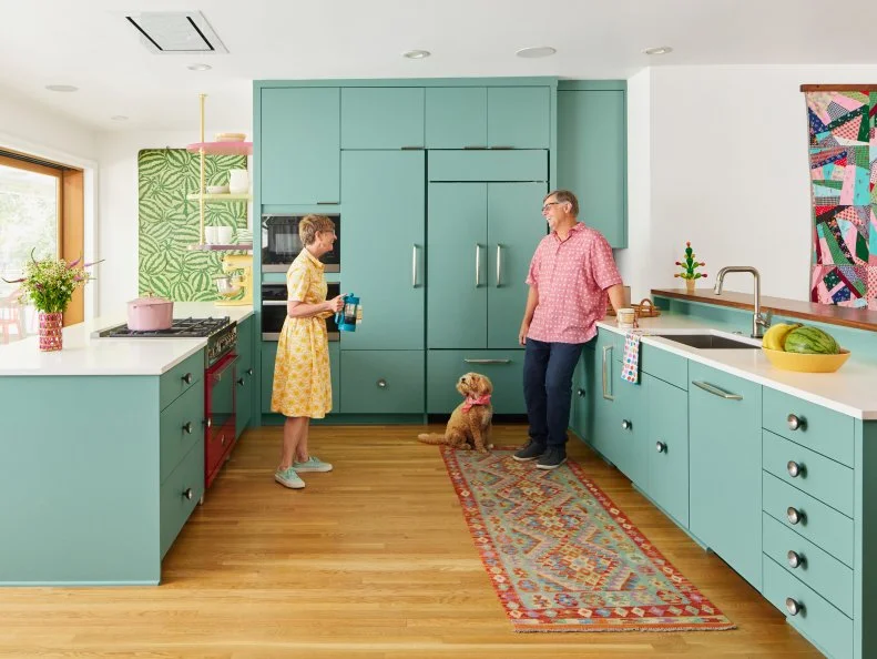 Kitchen With Blue-Green Cabinets and a Vintage Rug