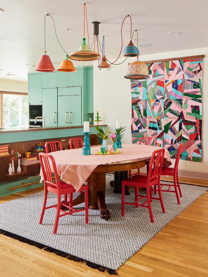 Colorful Dining Room With a Hanging Vintage Quilt