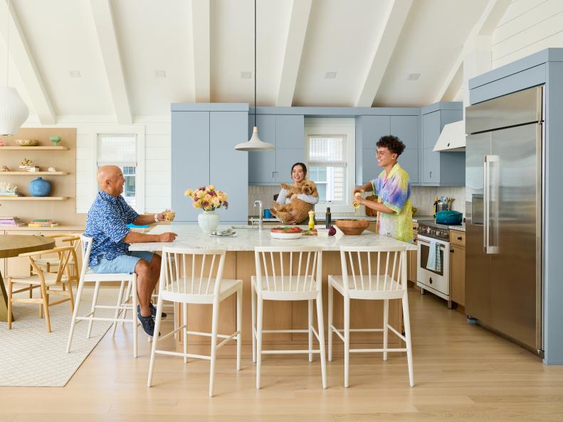 Contemporary Kitchen With Light Blue Cabinets and an Island