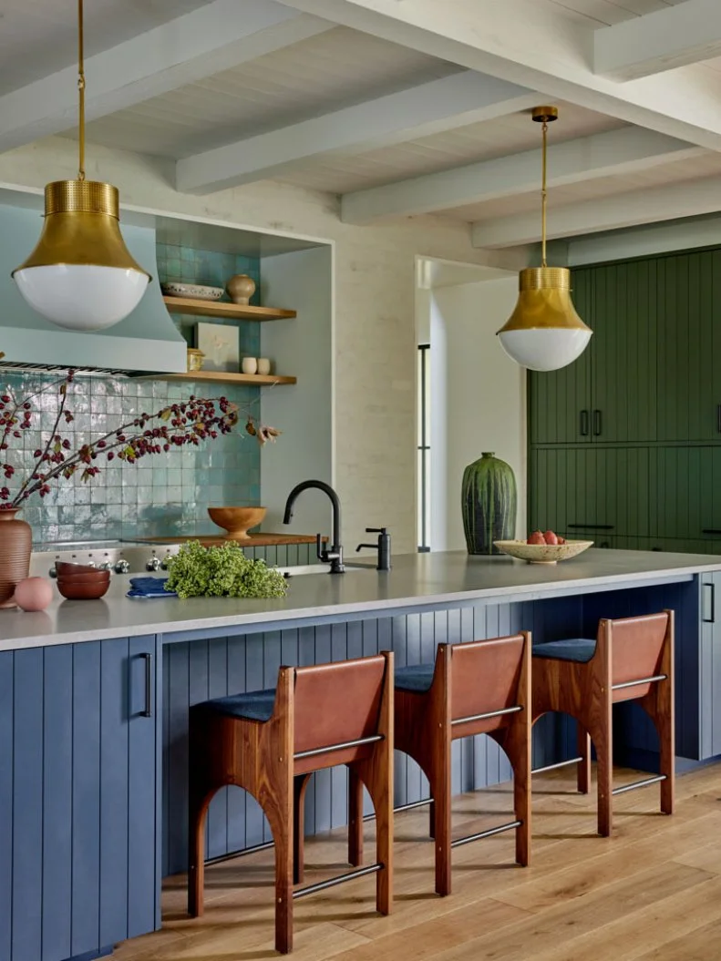Low-Backed Barstools at Island in Blue and Green Kitchen