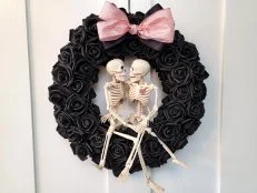 Kissing Skeletons in a Black Rose Halloween Wreath