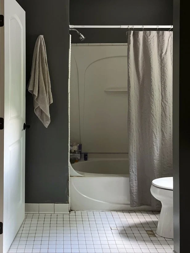 HGTV Magazine shares the DIY makeover of this bathroom.