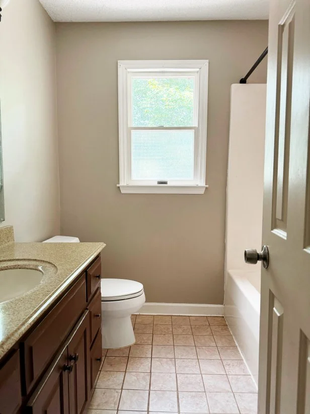 HGTV Magazine shares the DIY makeover of this bathroom.