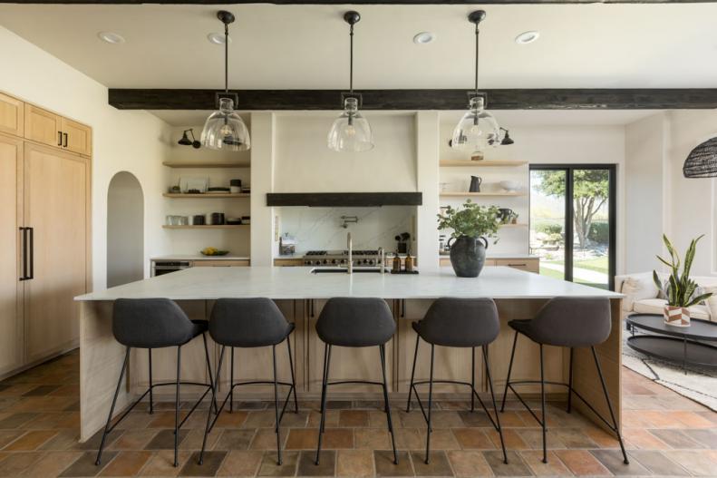 Mediterranean Kitchen With Gray Stools