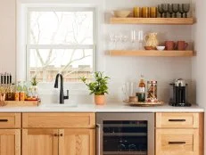 Kitchen Coffee Station With White Subway Tile and Wood Cabinets