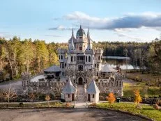 Gothic-Inspired Castle With a Glass Dome and a Pond