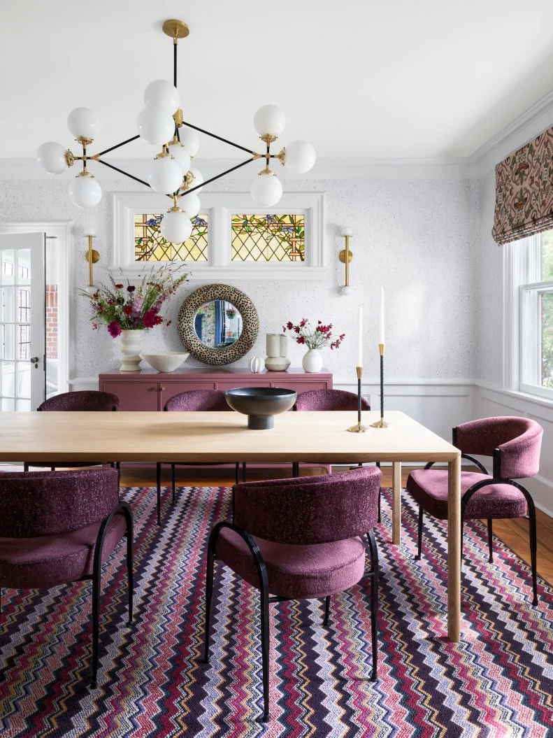 White Dining Room With Purple Furniture and Decor