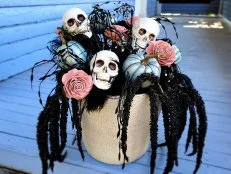 Halloween Outdoor Planter With Skulls, Pink Roses and Turquoise Pumpkins