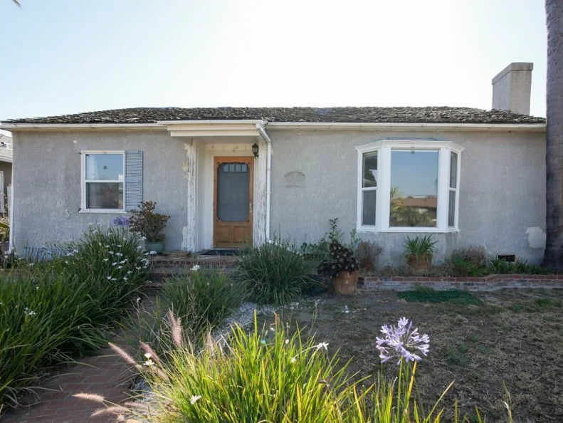 The front exterior of Tarek and Heather's house before flip, as seen on The Flip Off, Season 1.