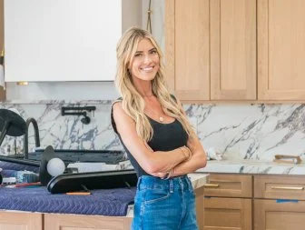 Christina Haack poses for a portrait in her flipped kitchen, as seen on The Flip Off, Season 1.