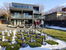 From left to right: Kathy Cox, Peg Cox, and Host David Bromstad explore the backyard of Blackwolf Bluff