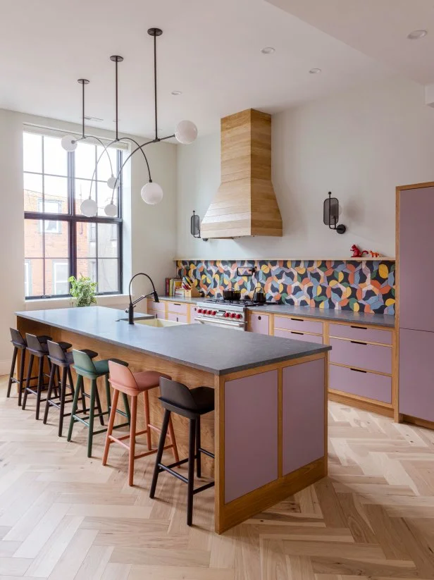 Modern Kitchen With Lavender Cabinets and a Multicolor Backsplash