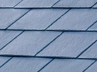 A Pattern of Grey Slates on a Roof - 1137773532