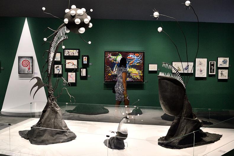 SHANGHAI, CHINA - JUNE 25: A fan observes artworks at the exposition The World of Tim Burton on June 25, 2016 in Shanghai, China. (Photo by Marcio Machado/Getty Images)