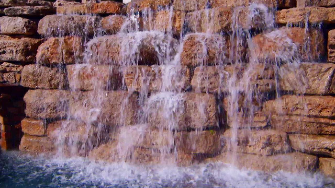 Rock Cliff and Waterfall Pool