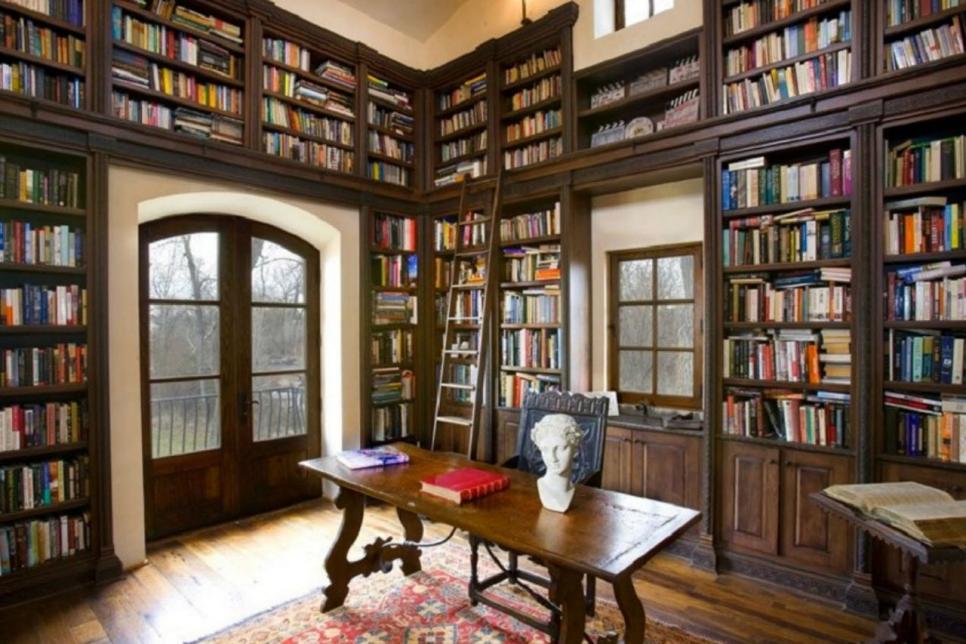 Tuscan Inspired Home With Two Story, Tuscan Bookcase Wall And Ladder