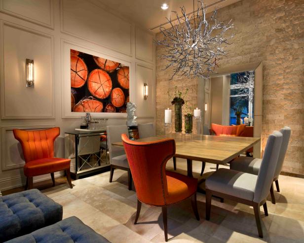 Contemporary Dining Room With Orange Wing Chairs & Branch Chandelier