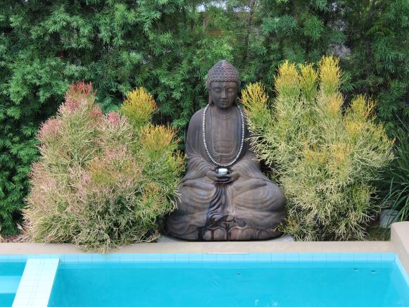 Buddha Statue by Pool