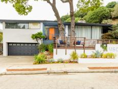 Midcentury Modern Home Exterior With Orange & Blue Front Door Accents