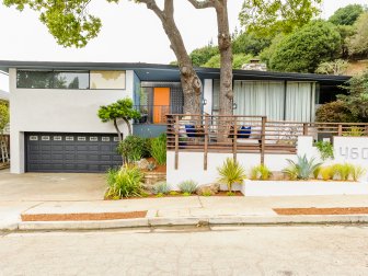 Midcentury Modern Home Exterior With Orange & Blue Front Door Accents