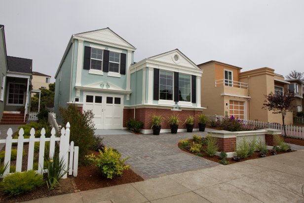 Light Blue Exterior With Black Shutters & White Trim