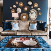 Eclectic Living Room With Custom Ottoman and Velvet Sofa and Chair