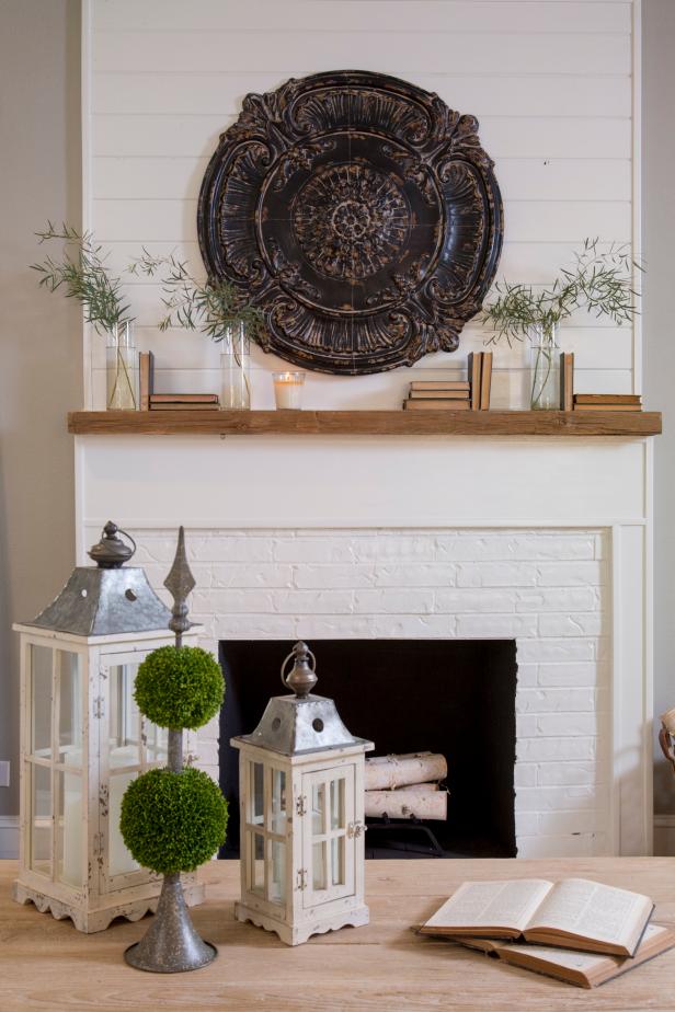 Neutral Coffee Table and a Black and White Fireplace 