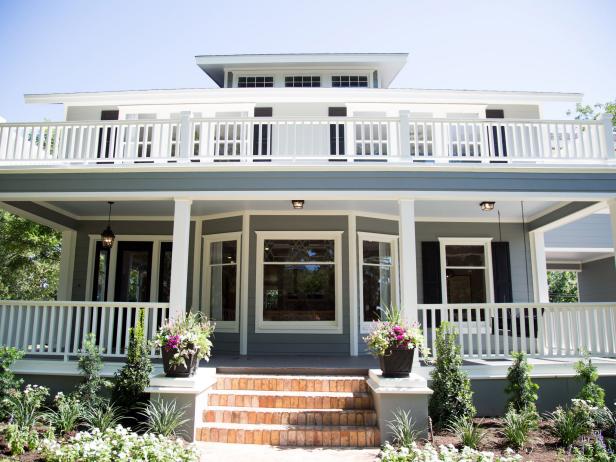 The Dansby's new home has been renovated from the inside out. The home's exterior has new siding, paint, window shutters, roof, and landscaping, as seen on Fixer Upper. (exterior)