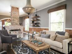 Rustic Chic Living Room With Natural Wood Paneling and Exposed Fireplace