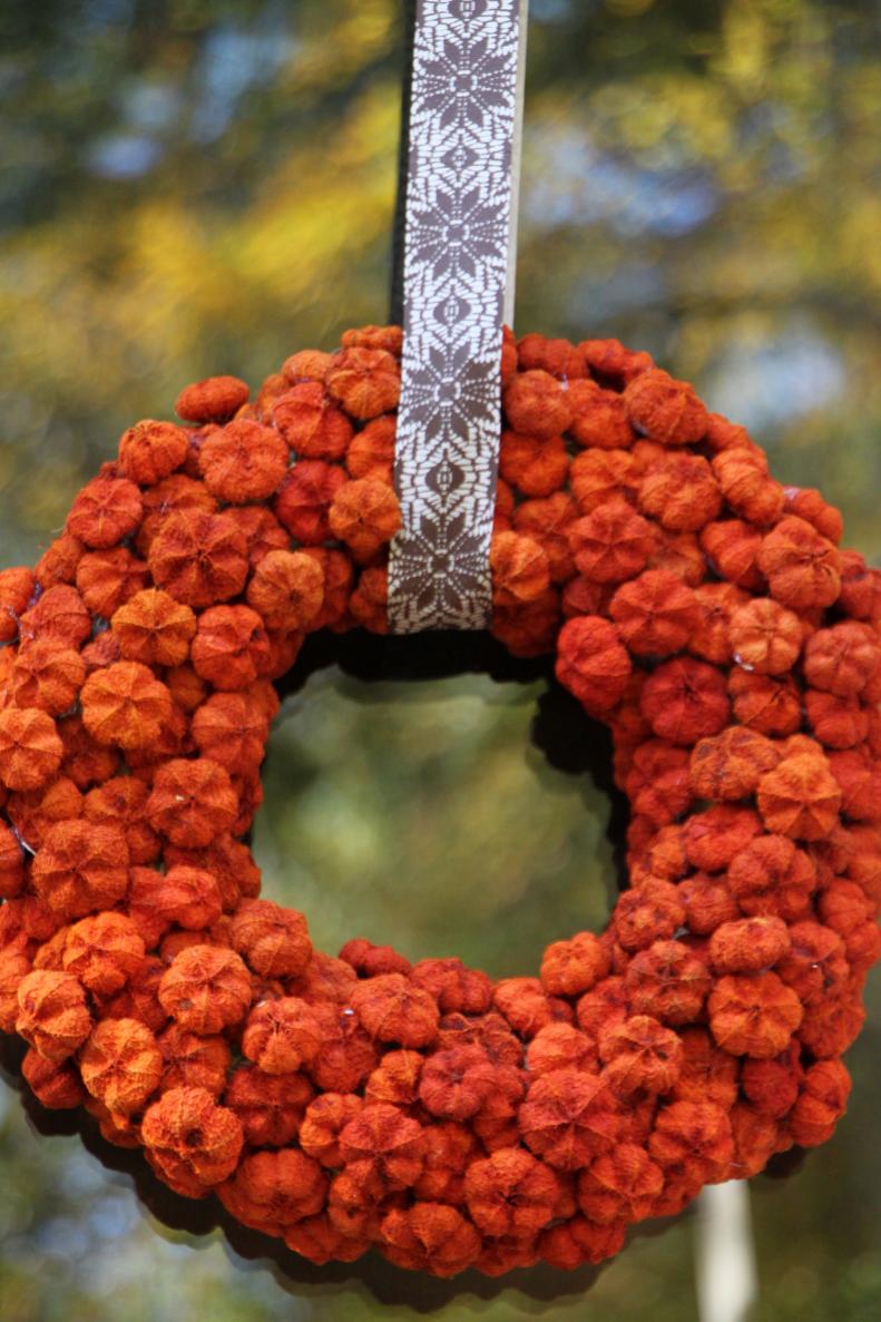 With a few simple changes, this wreath can adorn your door from Halloween through Thanksgiving. From the door to the table, this wreath has you covered.