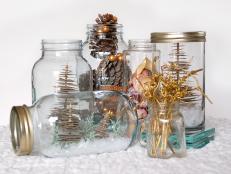 Bring the outdoors in by displaying your favorite bits of the winter world in charming mason jars.