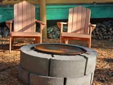 A simple outdoor fire pit can be constructed out of cinder block.
