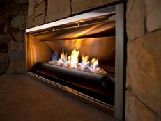 Thin-set Utah limestone surrounds the vent-free gas fireplace, a stainless steel and extruded-aluminum unit protected in a high-temperature, powder-coated finish.