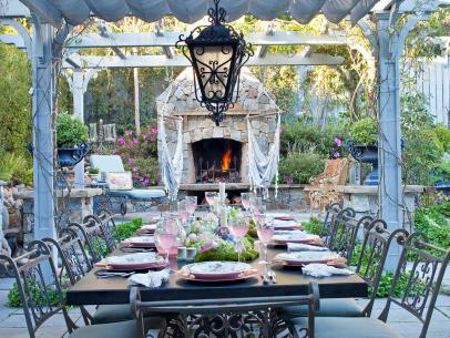 Outdoor dining 2025 table with fireplace