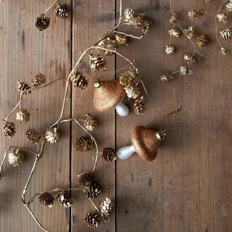 No foraging required! These frosted glass mushrooms complement any tree with woodsy warm metallic colors. $8; <a href="http://www.westelm.com/products/glass-mushroom-ornament-d1480/?pkey=e%7Cmushroom%7C16%7Cbest%7C0%7C1%7C24%7C%7C2&amp;cm_src=PRODUCTSEARCH||NoFacet-_-NoFacet-_-NoMerchRules-_-" target="_blank">westelm.com</a>