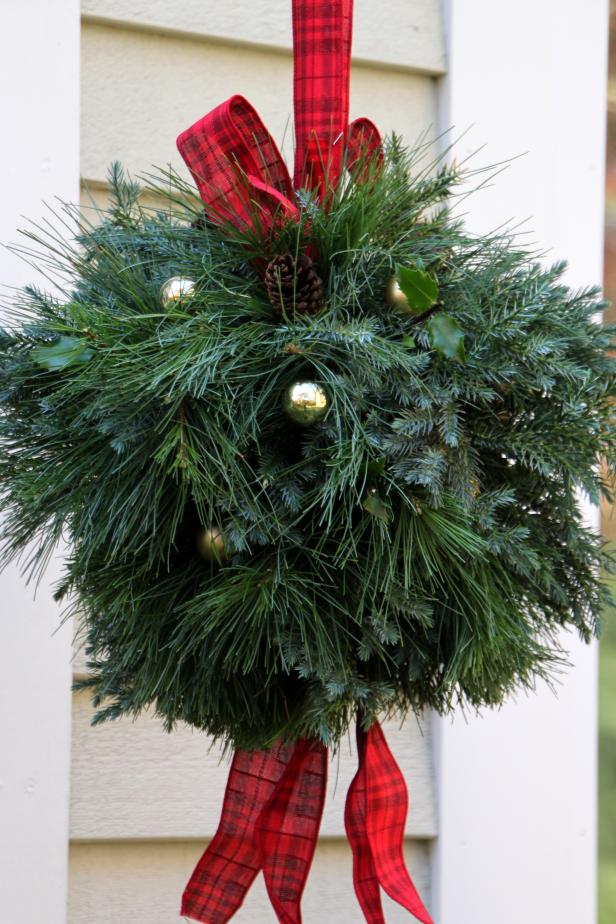 Snip some greenery from your yard and gardens and create a lovely kissing ball to welcome guests to your home for the holidays.