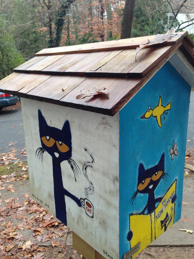 A combination homage to The New Yorker magazine and Pete the Cat, this book house was built by Michael Montgomery and painted by James Dean, the popular author/illustrator of children's books such as Pete the Cat: I Love My White Shoes.