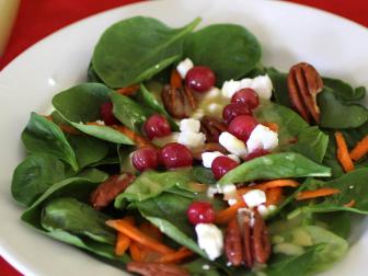 Spinach topped with pecans, cranberries and maple vinaigrette puts fresh salad back on the table this winter.