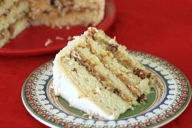 Holiday Lane cake layers white cake with bourbon soaked fruit.