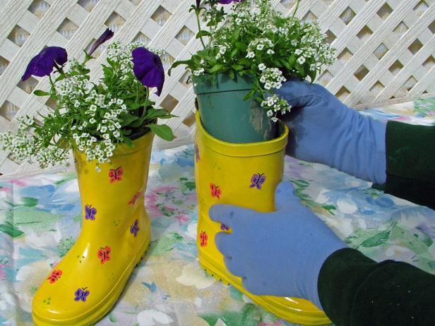 You can skip planting seeds and place a potted plant in a rain boot for a ready-to-go butterfly garden.