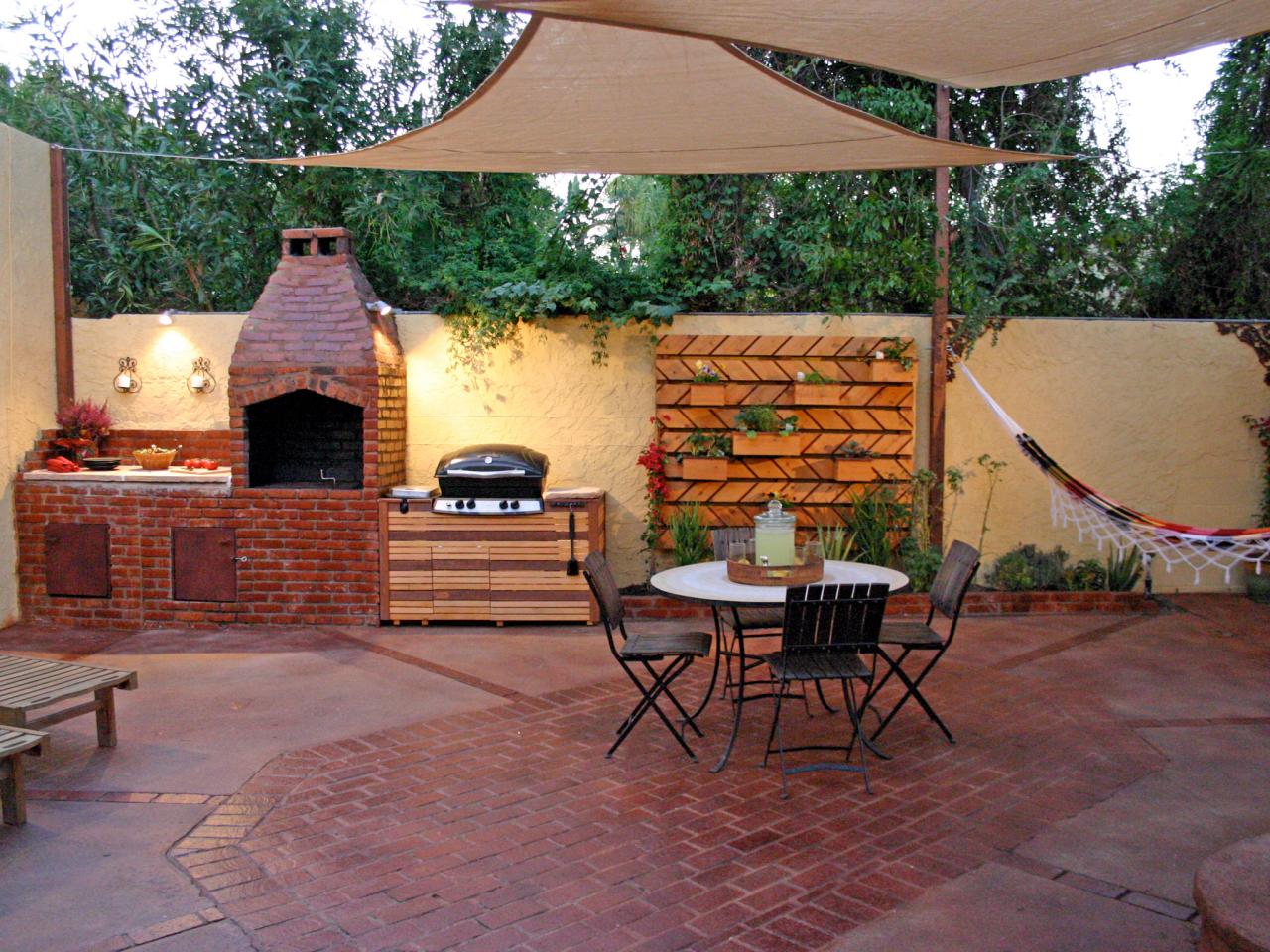 outdoor brick fireplace and grill