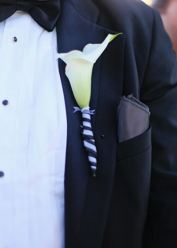 30. Colleen:  White Calla Lily wrapped in black and white ribbon.