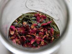 Add enough oil to cover your lavender and rose petals. Let it steep for a few days.